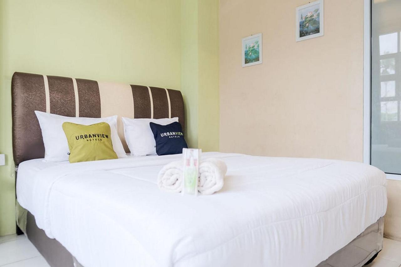 Urbanview Hotel Ta Ke Jelutung Puncak Jambi Exterior foto